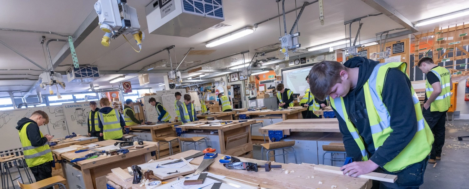 Carpentry and joinery students in workshop