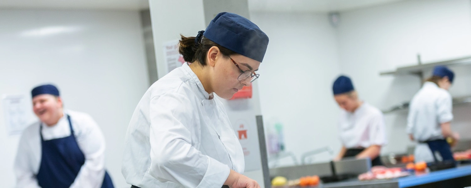 Catering students working in the MidKent College kitchens