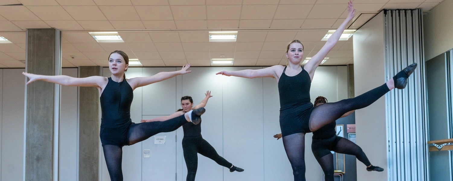 Dance students rehearsing for a performance