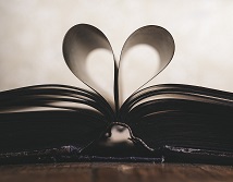 Book open in a heart