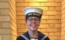 Former student in navy uniform