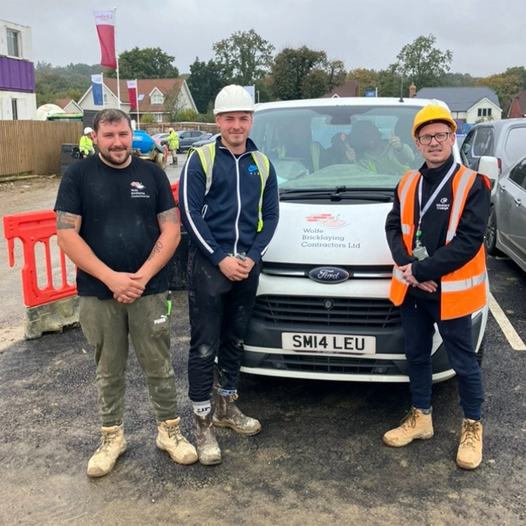 Apprentice of the Month Archie with his supervisor and MidKent College assessor smiling at the camera.. 