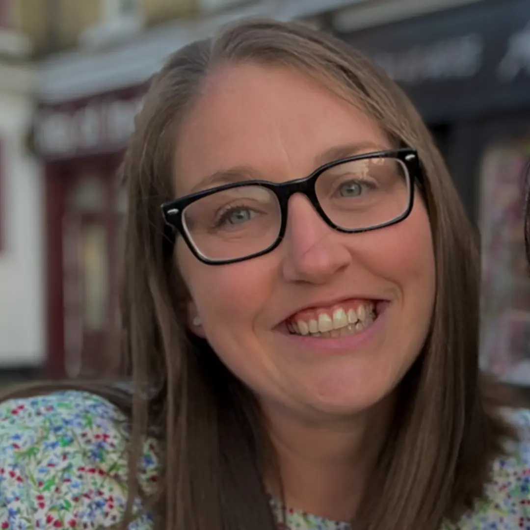 Katie smiling at the camera