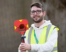 Student using construction equipment