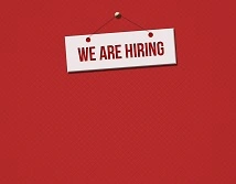 Red and white sign of We are hiring